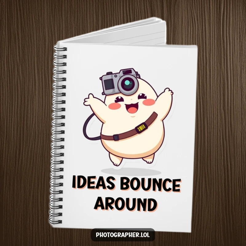 Funny plump character joyfully bouncing with a camera strap on a notebook cover, a humorous and inspiring writing tool.