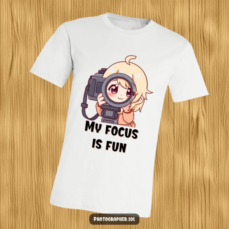 Funny t-shirt of a character intently looking through a camera viewfinder with a cheerful expression, perfect for photography enthusiasts.