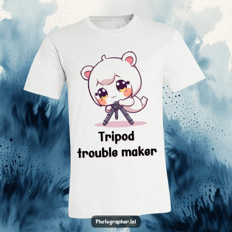 Funny T-Shirt: A wide-eyed tiny character hilariously tumbles and spins, tripping over a camera tripod.