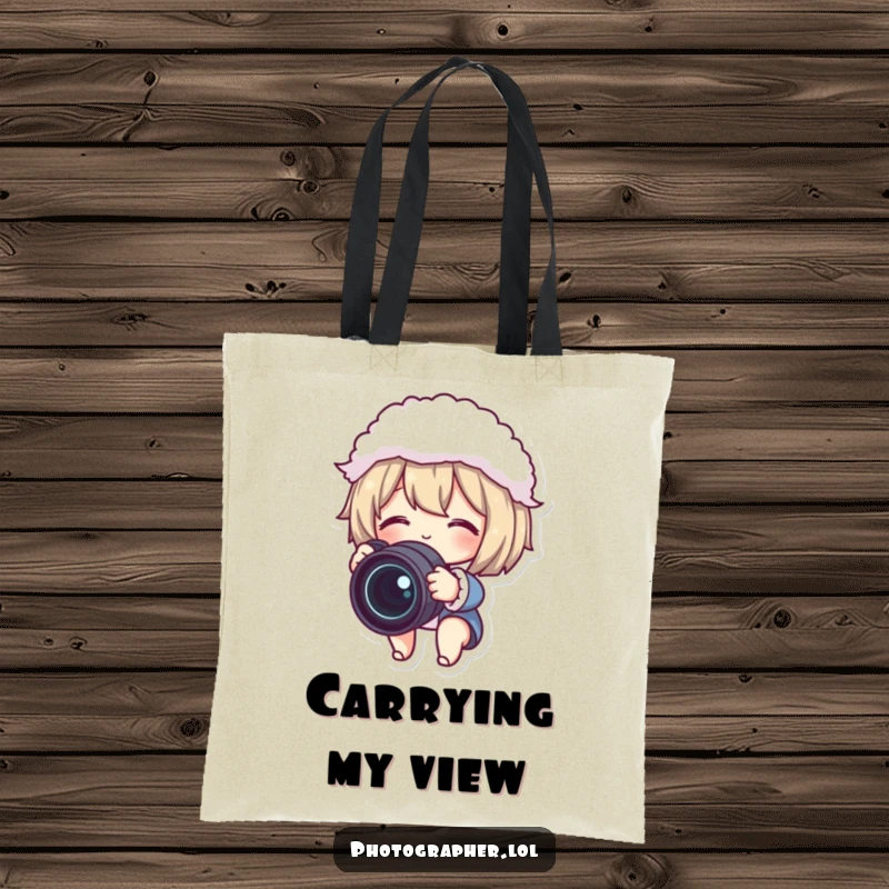 Funny tote bag featuring a cute character adjusting a camera lens with a fluffy lens cap, ideal for carrying photography gear humorously.