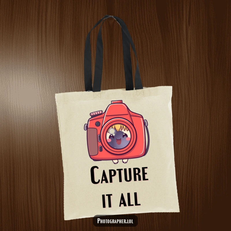 Funny tote bag with a character peeking behind a red camera, perfect for carrying photography gear, a great funny gift.